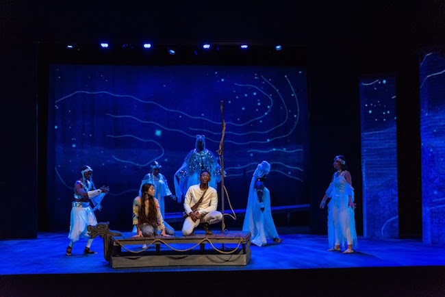 A scene at sea featuring the cast of The Black Rep's production of 'Dontrell, Who Kissed the Sea,' photo by Philip Hamer. A scene at sea featuring the cast of The Black Rep's production of 'Dontrell, Who Kissed the Sea,' photo by Philip Hamer.