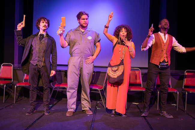 The cast of Fly North Theatricals production of 'Assassins' introduces their characters in the opening number, photo by John Gramlich The cast of Fly North Theatricals production of 'Assassins' introduces their characters in the opening number, photo by John Gramlich