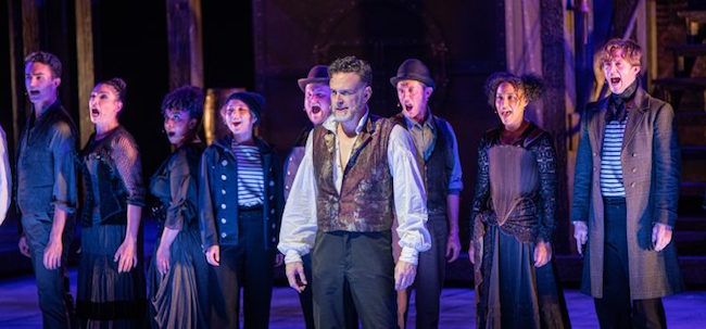 Ben Davis as Sweeney Todd, and the ensemble in The Muny's production of 'Sweeney Todd, the Demon Barber of Fleet Street,' photo by Julie A. Merkle. Ben Davis as Sweeney Todd, and the ensemble in The Muny's production of 'Sweeney Todd, the Demon Barber of Fleet Street,' photo by Julie A. Merkle.