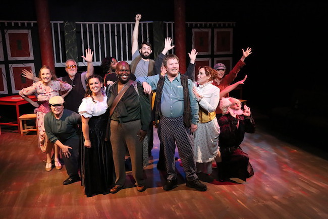 Chris Kernan, as Nick Bottom, and Marshall Jennings, as Nigel Bottom, lead the cast in a song in New Line Theatre's production of 'Something's Rotten!', photo by Jill Ritter Lindberg. Chris Kernan, as Nick Bottom, and Marshall Jennings, as Nigel Bottom, lead the cast in a song in New Line Theatre's production of 'Something's Rotten!', photo by Jill Ritter Lindberg.