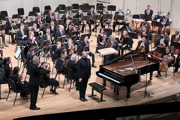 L-R: Hannu Lintu and Kirill Gerstein take bows. Photo: Chuck Lavazzi